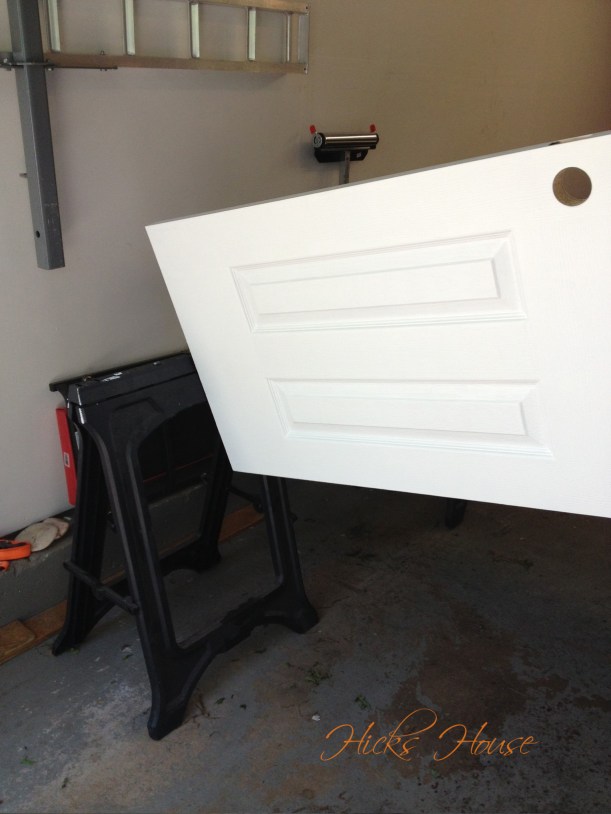 See how the door is balanced on the one screw?