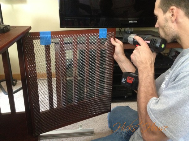 he pre-drilled in all 4 corners and 1 in the middle