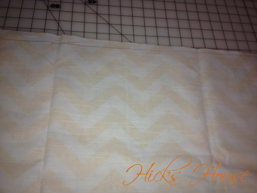 see how my line doesn't line up with the edge of the fabric?